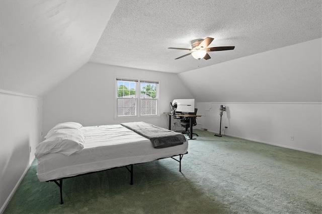 12509 W 100th Ter, Lenexa, KS 66215 - bedroom featuring vaulted ceiling, carpet floors, a ceiling fan, and a textured ceiling