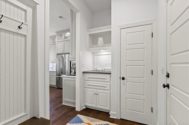 15945 W 165th St, Olathe, KS 66062 - hall featuring dark wood-type flooring