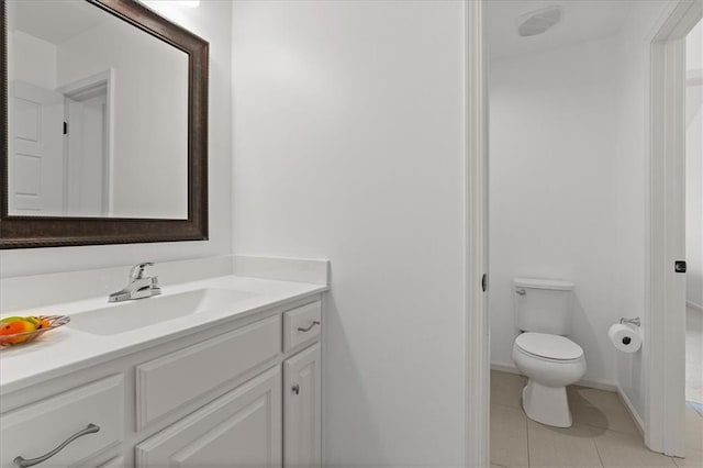 15945 W 165th St, Olathe, KS 66062 - bathroom featuring vanity, toilet, tile patterned flooring, and baseboards