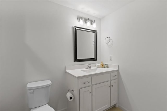 15945 W 165th St, Olathe, KS 66062 - half bath with toilet, vanity, and baseboards