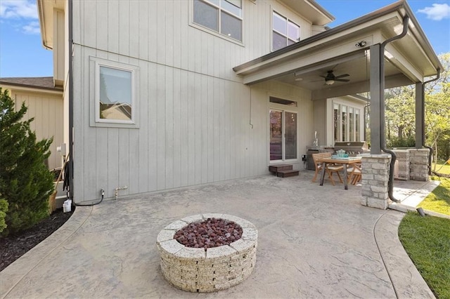 15945 W 165th St, Olathe, KS 66062 - view of patio with ceiling fan, an outdoor fire pit, and outdoor dining space