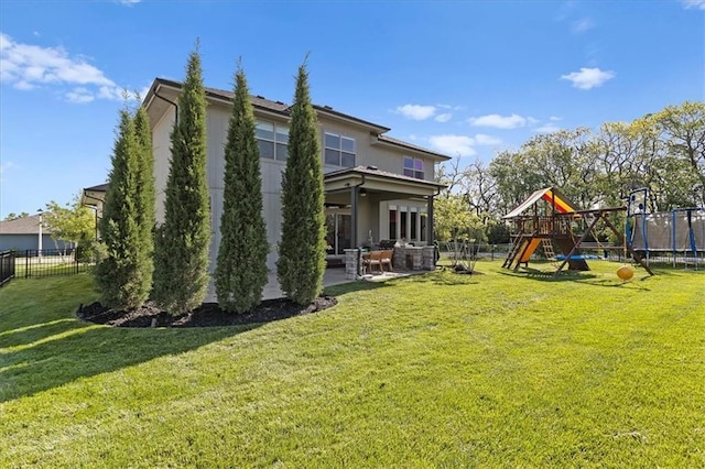15945 W 165th St, Olathe, KS 66062 - back of property with a patio and a playground