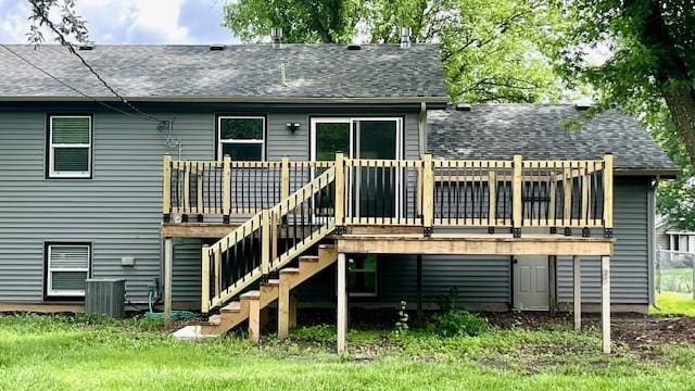 1636 S Poplar St, Ottawa, KS 66067 - rear view of house with a deck, a shingled roof, and stairs