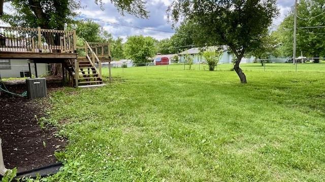 1636 S Poplar St, Ottawa, KS 66067 - view of yard with stairs and a wooden deck