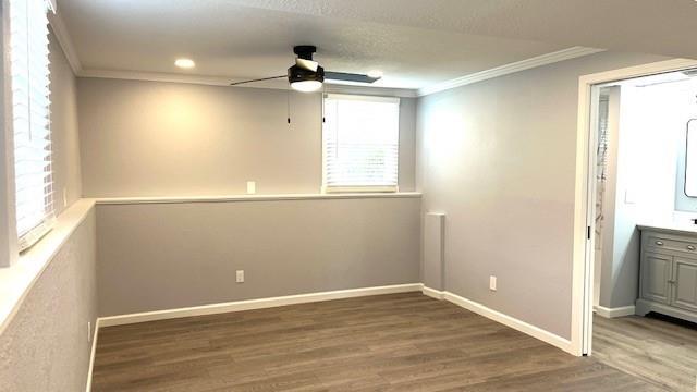 1636 S Poplar St, Ottawa, KS 66067 - spare room featuring ornamental molding, a ceiling fan, wood finished floors, baseboards, and recessed lighting