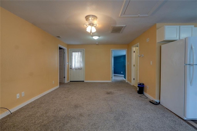 814 E Hayward Ave, Independence, MO 64050 - carpeted empty room with baseboards and attic access