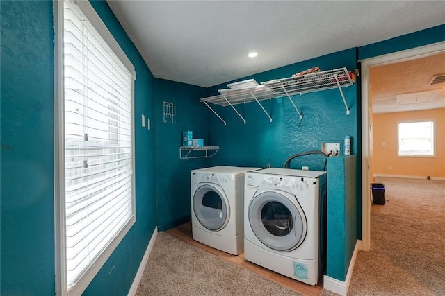 814 E Hayward Ave, Independence, MO 64050 - washroom with washing machine and clothes dryer, baseboards, and carpet flooring