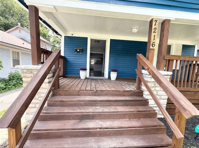 7216 Indiana Ave, Kansas City, MO 64132 - view of wooden porch