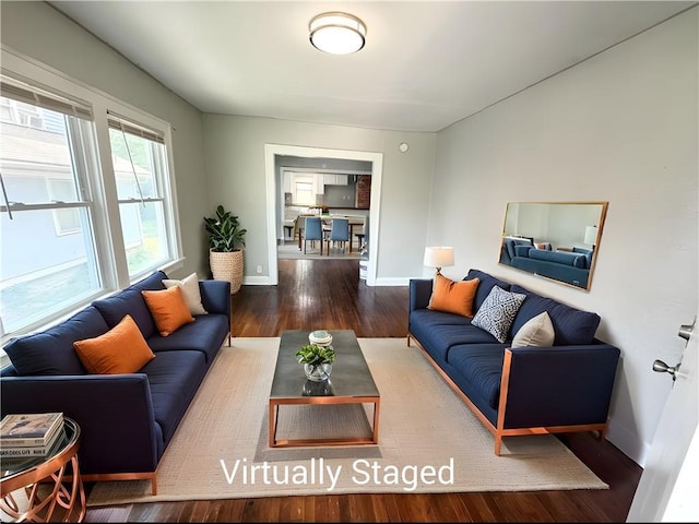 7216 Indiana Ave, Kansas City, MO 64132 - living area featuring wood finished floors and baseboards