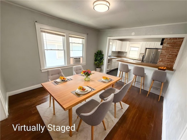 7216 Indiana Ave, Kansas City, MO 64132 - dining area with dark wood-type flooring, crown molding, baseboards, and cooling unit