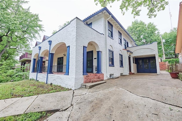 918 W 32nd Ter, Kansas City, MO 64111 - view of property exterior with stucco siding