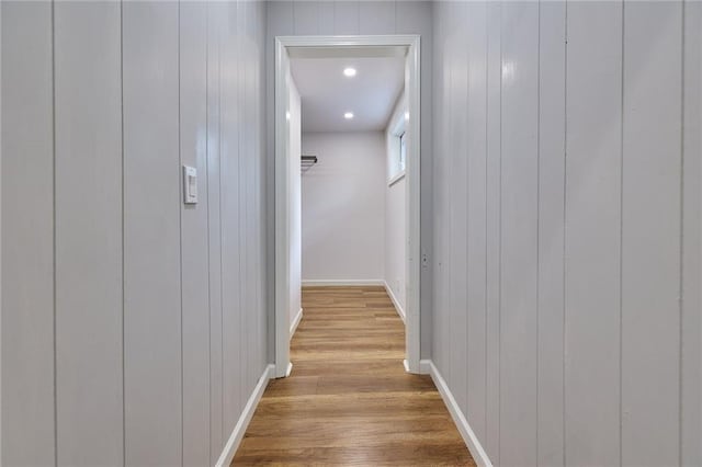 918 W 32nd Ter, Kansas City, MO 64111 - hallway featuring wood finished floors, baseboards, and recessed lighting