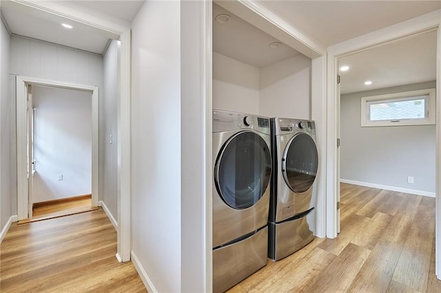 918 W 32nd Ter, Kansas City, MO 64111 - laundry area with light wood-type flooring, washer and dryer, recessed lighting, and baseboards