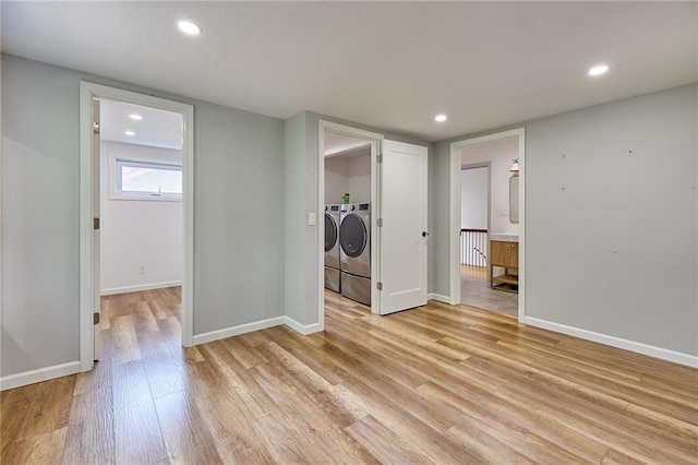918 W 32nd Ter, Kansas City, MO 64111 - empty room featuring washer and dryer, light wood-style floors, recessed lighting, and baseboards
