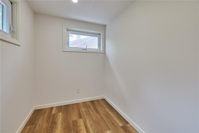 918 W 32nd Ter, Kansas City, MO 64111 - empty room with baseboards and wood finished floors