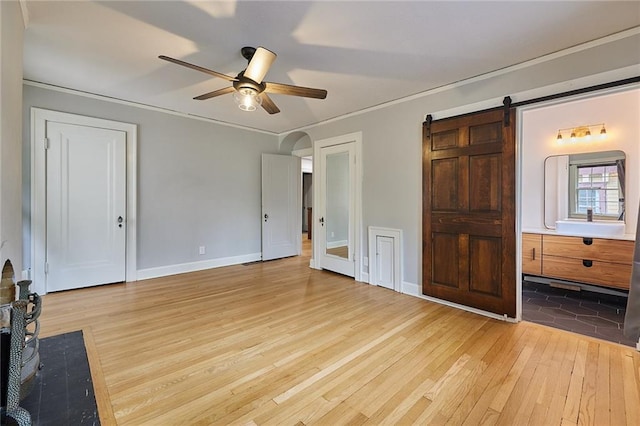 918 W 32nd Ter, Kansas City, MO 64111 - unfurnished bedroom with hardwood / wood-style flooring, ensuite bath, baseboards, a ceiling fan, and crown molding