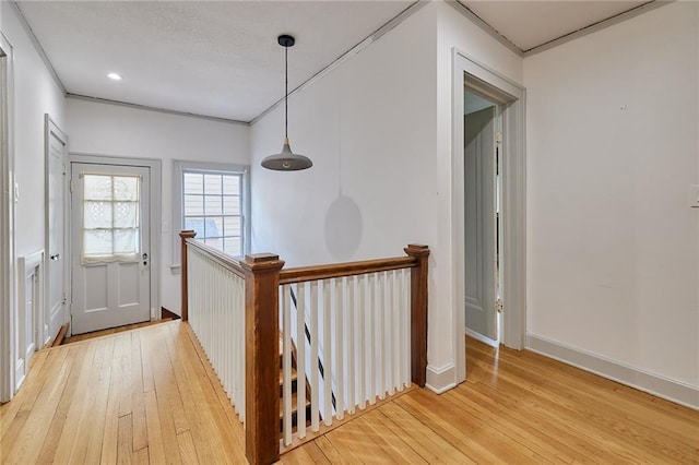 918 W 32nd Ter, Kansas City, MO 64111 - hall with an upstairs landing, light wood-type flooring, baseboards, and recessed lighting