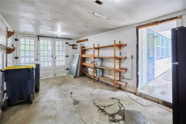 918 W 32nd Ter, Kansas City, MO 64111 - misc room featuring unfinished concrete floors