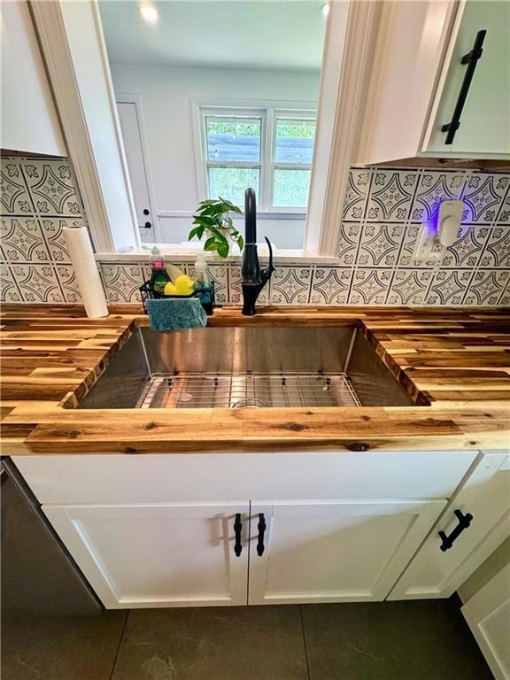 908 N 8th St, Lansing, KS 66043 - kitchen view of wooden counters and decorative backsplash