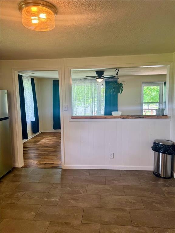 908 N 8th St, Lansing, KS 66043 - unfurnished room featuring a textured ceiling