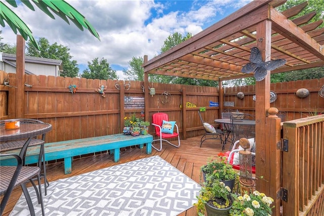 208 N Ohio St, Archie, MO 64725 - wooden terrace featuring outdoor dining area