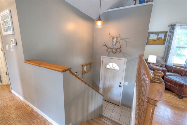 208 N Ohio St, Archie, MO 64725 - foyer with vaulted ceiling, wood finished floors, and baseboards