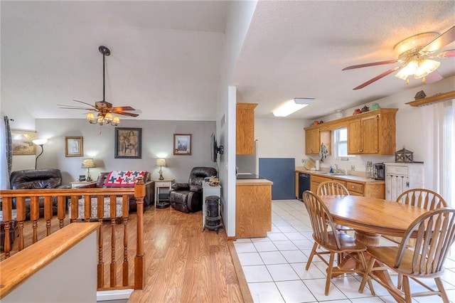 208 N Ohio St, Archie, MO 64725 - dining space with ceiling fan and light wood-style floors