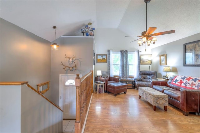208 N Ohio St, Archie, MO 64725 - living room featuring ceiling fan and high vaulted ceiling