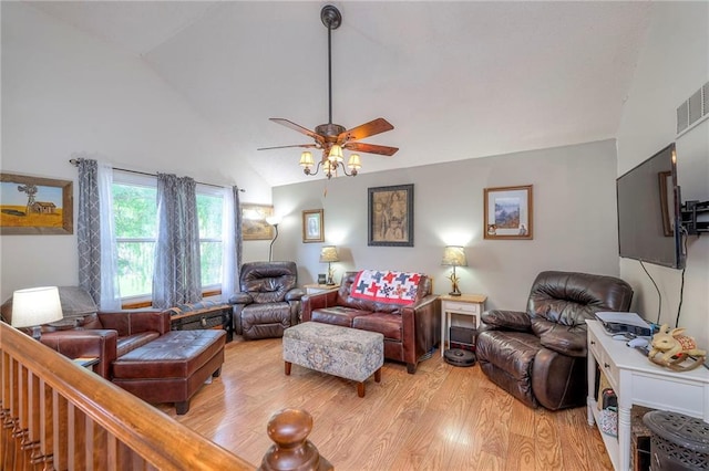 208 N Ohio St, Archie, MO 64725 - living area featuring a ceiling fan, light wood-type flooring, and high vaulted ceiling
