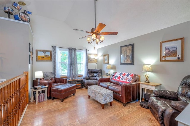 208 N Ohio St, Archie, MO 64725 - living area with a ceiling fan, light wood-style flooring, and high vaulted ceiling