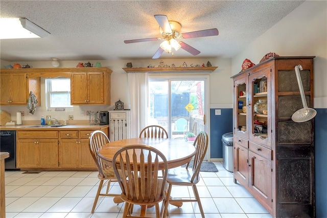 208 N Ohio St, Archie, MO 64725 - dining area featuring ceiling fan, a textured ceiling, and light tile patterned flooring