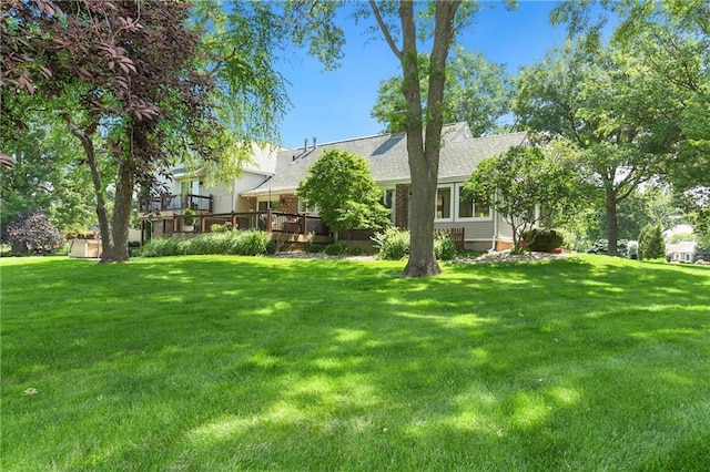 1908 Pine Ridge Dr, Leavenworth, KS 66048 - view of grassy yard featuring a deck