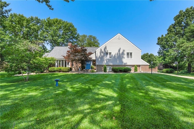1908 Pine Ridge Dr, Leavenworth, KS 66048 - split level home with a front lawn and a chimney