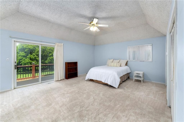 1908 Pine Ridge Dr, Leavenworth, KS 66048 - carpeted bedroom featuring access to outside, a textured ceiling, and a ceiling fan