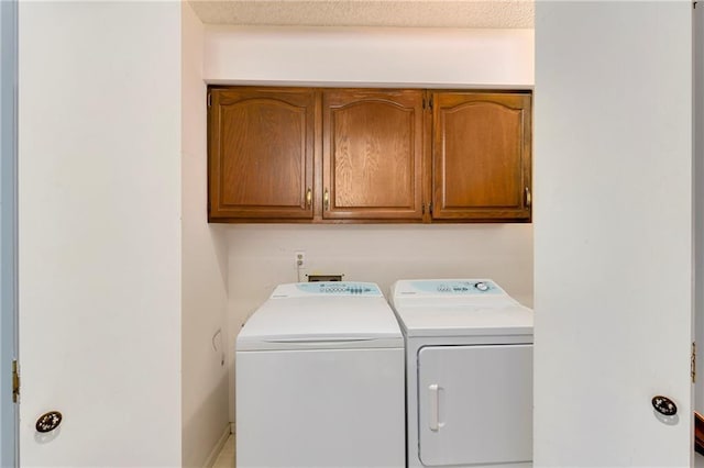 1908 Pine Ridge Dr, Leavenworth, KS 66048 - laundry area with independent washer and dryer and cabinet space