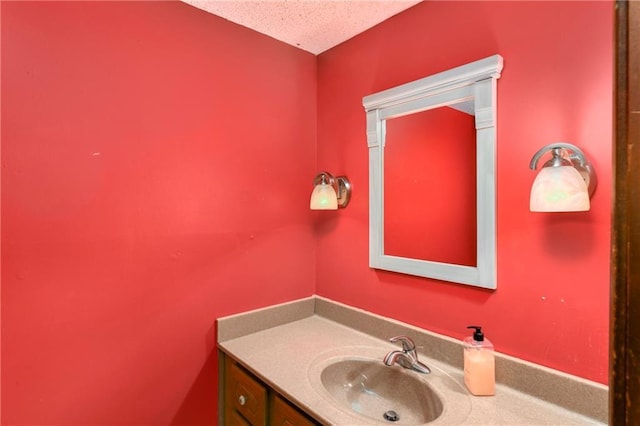 1908 Pine Ridge Dr, Leavenworth, KS 66048 - bathroom featuring vanity and a textured ceiling