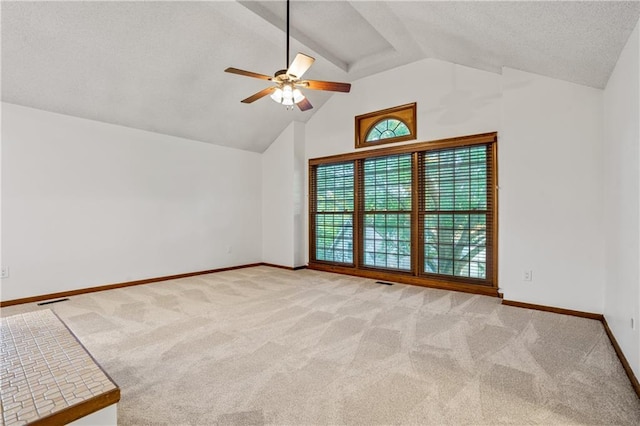 8541 Oakview Dr, Lenexa, KS 66215 - carpeted spare room with ceiling fan, high vaulted ceiling, and a textured ceiling
