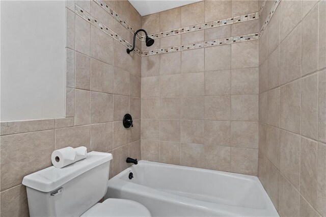 8541 Oakview Dr, Lenexa, KS 66215 - full bathroom featuring washtub / shower combination and tile walls