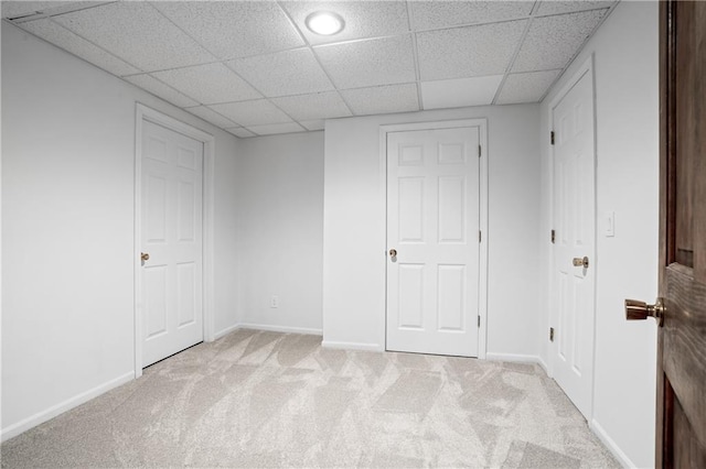 8541 Oakview Dr, Lenexa, KS 66215 - unfurnished bedroom with light colored carpet and a drop ceiling