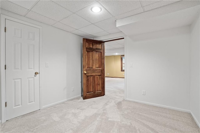 8541 Oakview Dr, Lenexa, KS 66215 - spare room featuring a paneled ceiling and carpet floors