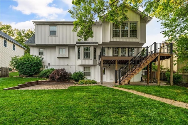 8541 Oakview Dr, Lenexa, KS 66215 - back of property with stairs, a deck, and a patio area