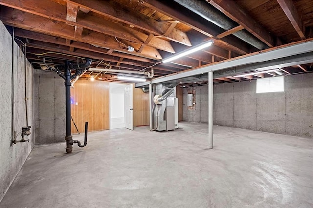 3501 N Delaware St, Independence, MO 64050 - below grade area featuring electric panel and heating unit