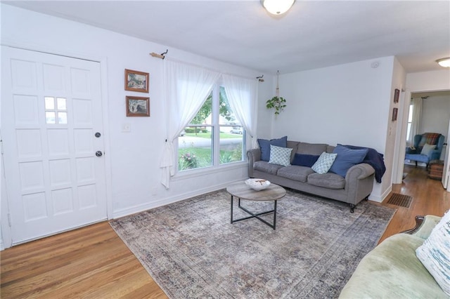 5904 N Howard Ave, Gladstone, MO 64118 - living room with wood finished floors and baseboards