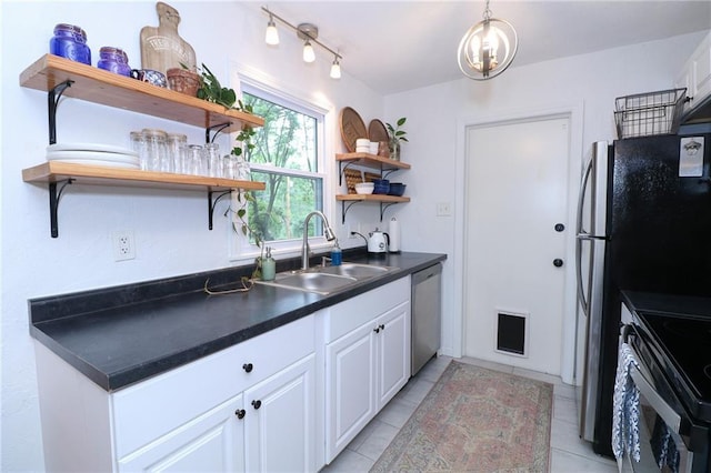 5904 N Howard Ave, Gladstone, MO 64118 - kitchen with a sink, dishwasher, open shelves, dark countertops, and white cabinets