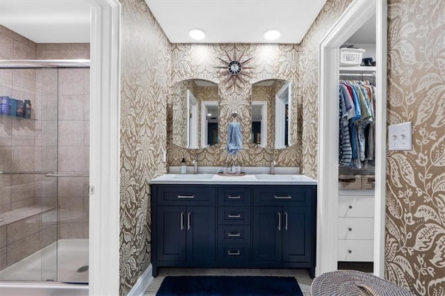 4325 W 112th St, Leawood, KS 66211 - bathroom with wallpapered walls, double vanity, and a stall shower