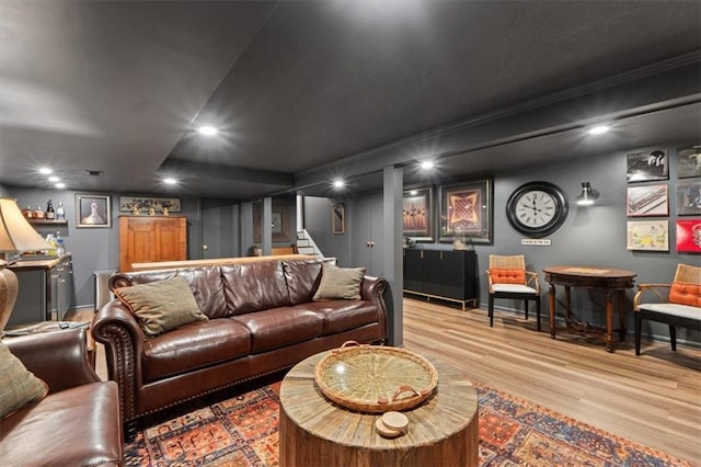 4325 W 112th St, Leawood, KS 66211 - living room featuring wood finished floors, recessed lighting, and stairway