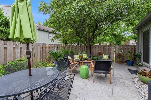 4325 W 112th St, Leawood, KS 66211 - fenced backyard featuring a patio area and outdoor dining area