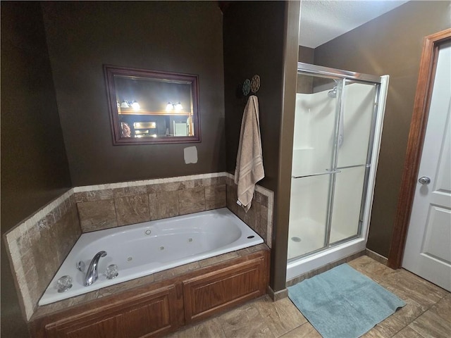 657 SW Tisha Ln, Grain Valley, MO 64029 - bathroom with a shower stall and a jetted tub