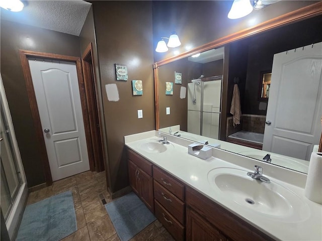 657 SW Tisha Ln, Grain Valley, MO 64029 - bathroom with a shower stall, a bath, and double vanity