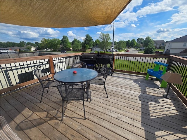657 SW Tisha Ln, Grain Valley, MO 64029 - wooden terrace with outdoor dining space
